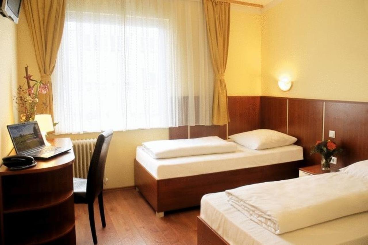 Atlas City Hotel Munique Quarto foto
